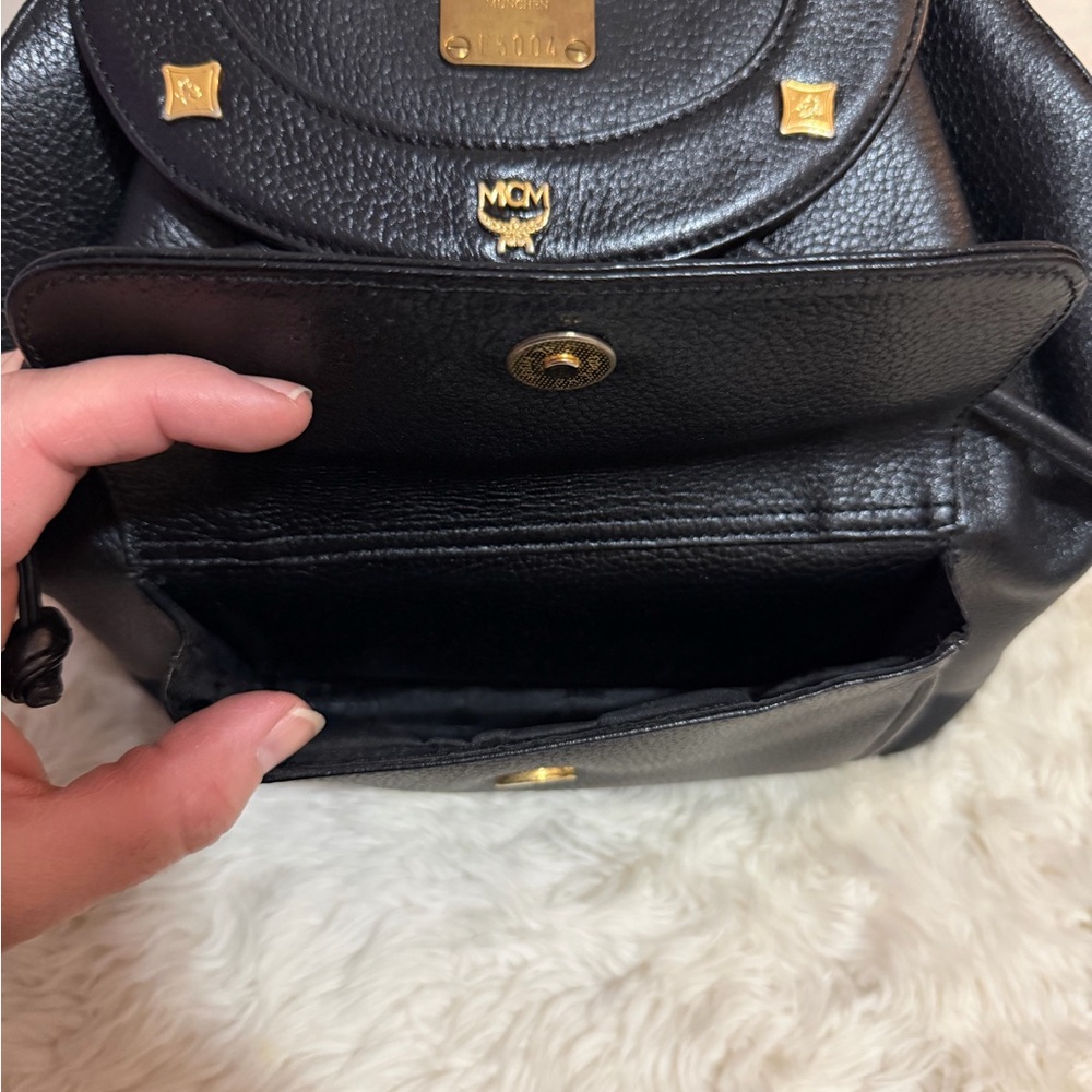 MCM Black Backpack with Gold Accents - Picture 9 of 12